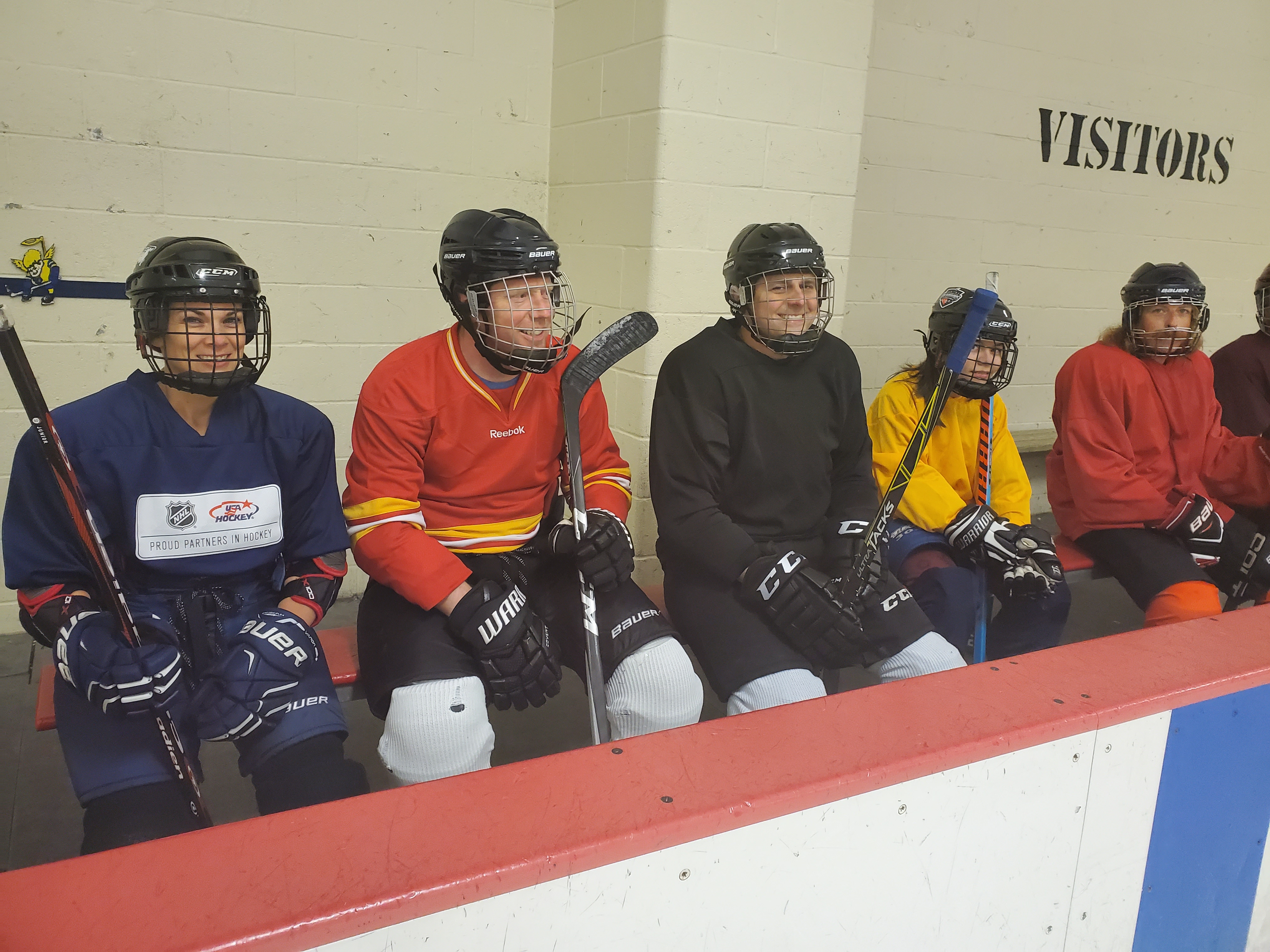 individuals in hockey gear