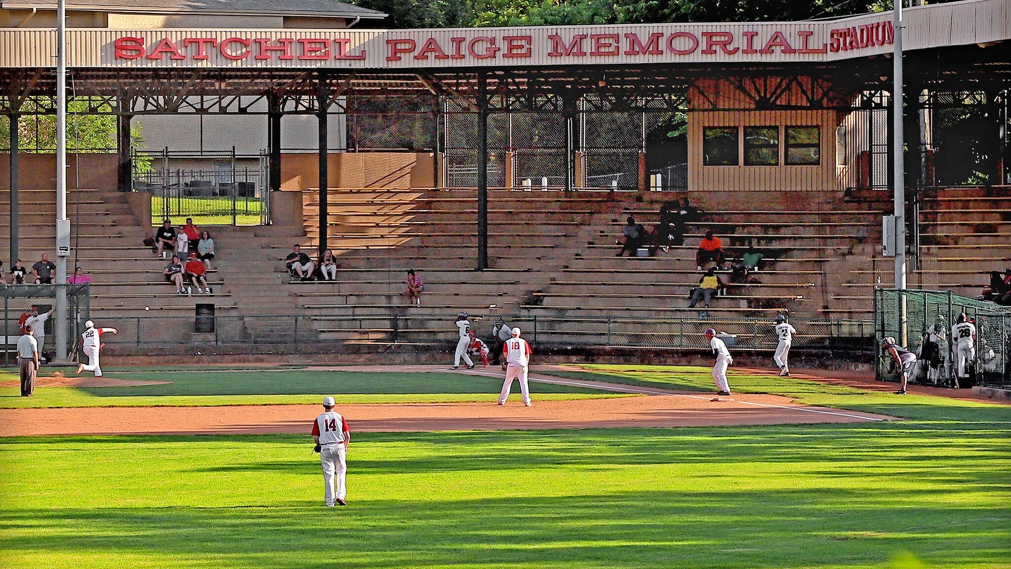 People playing baseball at Satchel Paige Memorial Stadium