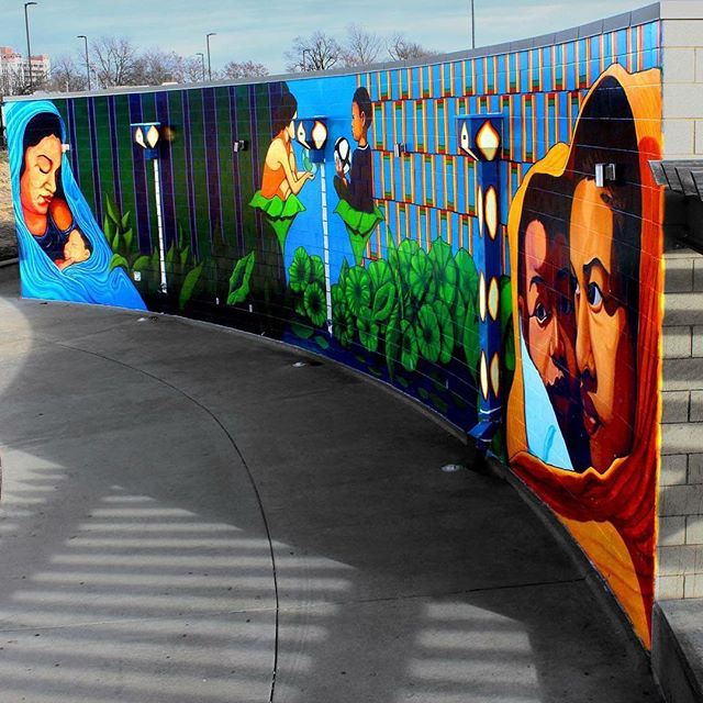 Photo of the mural at #KCParks 9th and Van Brunt Athletics Field. The mural, “The Sun and the Moon Dream of Each Other”, is by local artist José Faus. Photo via #KansasCityPics @rubengusmanphotography