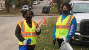 Women Volunteering for Trash Pickup at the Paseo