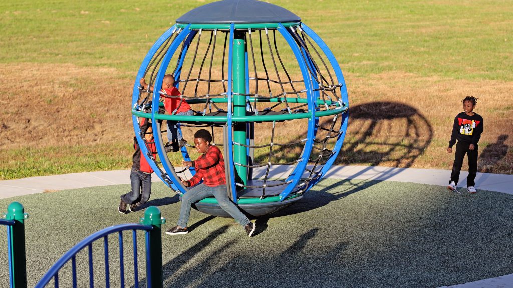 Kids playing in James A Reed Park