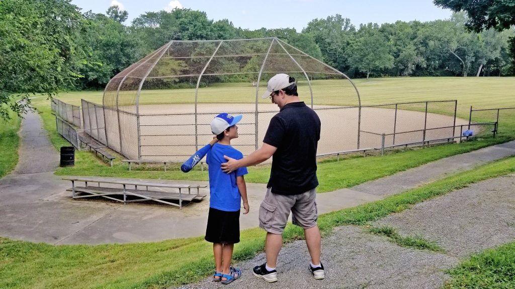 Boy with baseball gear