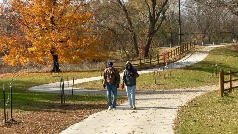 Individuals Walking on Little Blue Valley Park